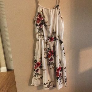 Short, white flower dress. Adjustable rope strap.